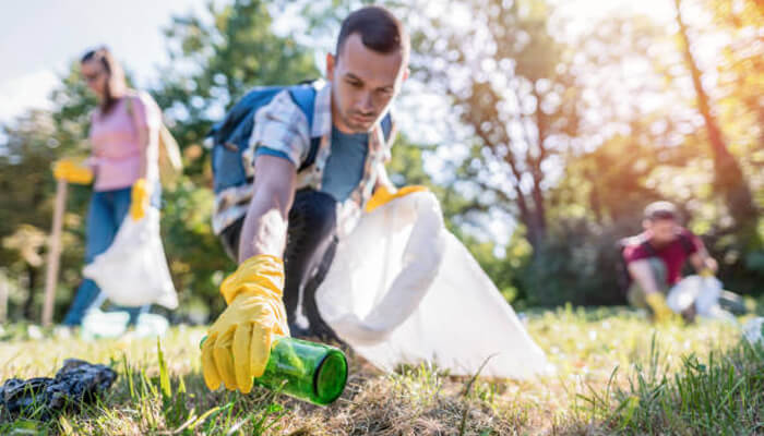 Pm narendra modi Volunteers cleaning a park by picking up litter as part of a community initiative inspired by pm narendra modi.