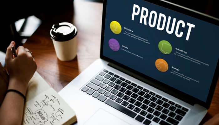 Innovative information product | tycoonstory media Laptop screen displaying product development strategy, highlighting innovation within a social enterprise.