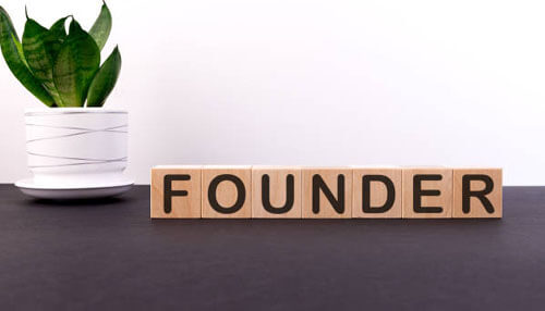 Capital structure Capital structure : wooden letter blocks spelling “founder” next to a plant, symbolizing a founder’s role in establishing and managing a business’s capital structure.