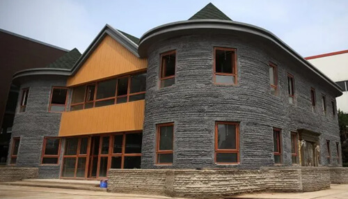 3d printed villa in chinа - tycoonstory | tycoonstory media Two-story residential building created using large-scale concrete 3d printing, demonstrating the future of 3d printed houses architecture.