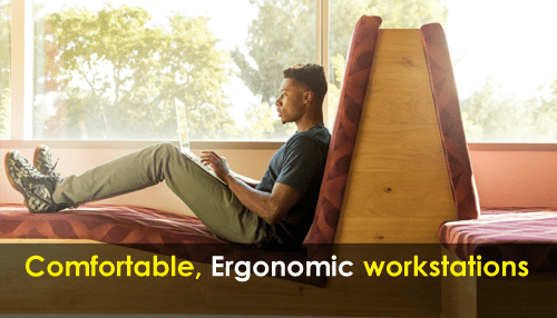 Employee-friendly office Person working on a laptop while sitting on a cushioned ergonomic workstation designed for comfort.