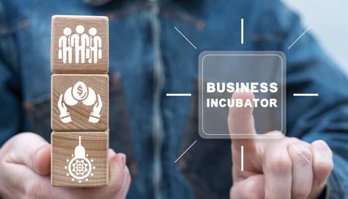 Business | tycoonstory media Concept illustration of business incubators showing funding, mentorship, and startup development support.