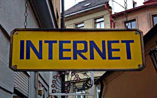 Internet provider to choose - tycoonstory | tycoonstory media A sign reading'INTERNET,' highlighting the importance of internet services and broadband internet access for modern connectivity.