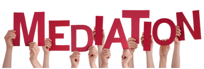 Family law Hands holding up letters spelling “mediation,” representing dispute resolution options commonly used in family law matters.