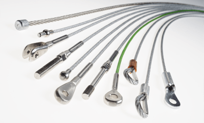 Wire ropes Various industrial wire ropes with different end fittings displayed on a white background for lifting, rigging, and load-bearing applications.