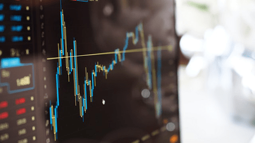 Acknowledgement Digital chart showing currency value fluctuations on a screen, symbolizing changing currency rates at a trusted exchange.