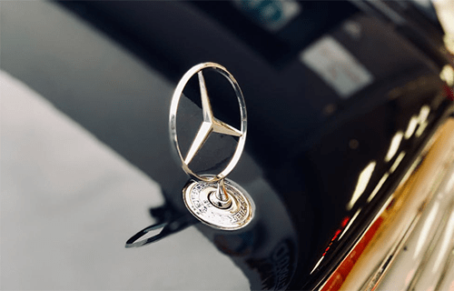 Well-designed business logo Well-designed business logo example represented by a luxury car emblem, symbolizing brand recognition, trust, and premium identity.