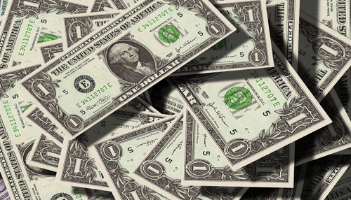 Money - tycoonstory | tycoonstory media Stack of us dollar bills symbolizing profits, capital, and financial growth in trading.