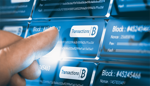 Cryptocurrency transactions - tycoonstory | tycoonstory media A close-up of a finger touching a digital blockchain with cryptocurrency transaction details, highlighting the underlying technology of cryptocurrency.