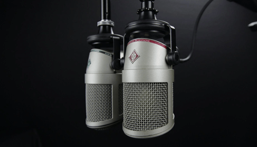 Advertising media Close-up of high-quality microphones, typically used in recording studios for broadcasting and podcasting.