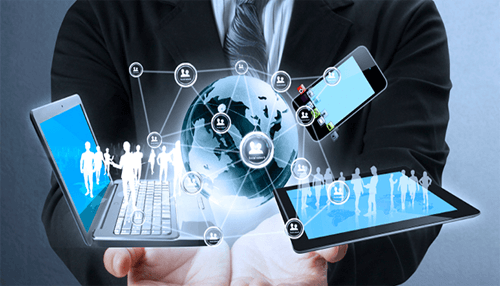 A business professional presenting a holographic globe surrounded by digital devices, symbolizing connectivity and public relations in a digital world Enhancing online presence for public relations for a business