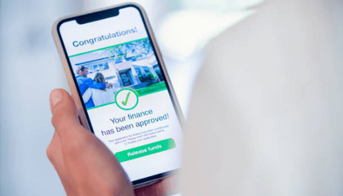 Fintech marketplace Smartphone screen displaying finance approval notification, highlighting fintech-based online marketplace ideas for online services and digital transactions.
