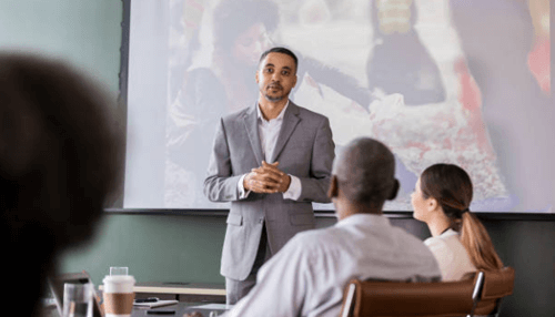 Startup accelerator Business mentor presenting to entrepreneurs during a startup accelerator workshop and training session.