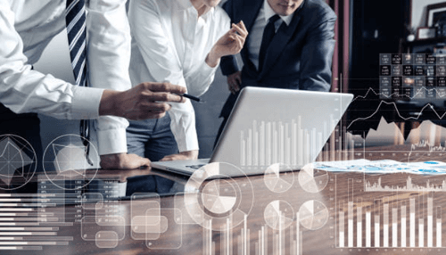 Business statistics-tycoonstory | tycoonstory media Statistics analysis showing business professionals reviewing data charts and graphs on a laptop.