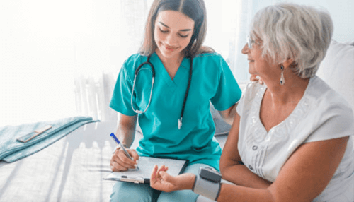 Doctor appointments and other errands - tycoonstory | tycoonstory media Senior woman receiving home care assistance from a healthcare professional during an in-home wellness check.