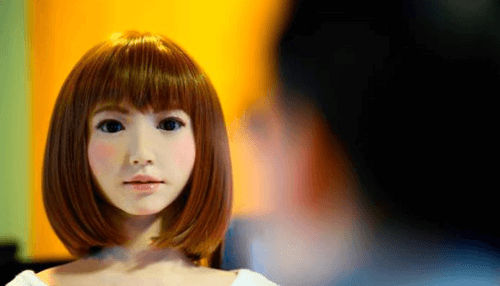 Humanoid robots Humanoid robot with short hair looking directly at a person, demonstrating emotional interaction capabilities of humanoid robots.