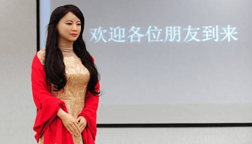 Humanoid robots Realistic female humanoid robot in red attire used for social interaction and customer engagement – growing role of humanoid robots in business environments.