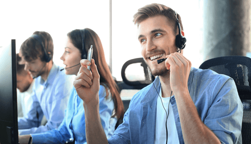 Different types of auto dialers Auto dialer technology in action as call center agents handle multiple outbound calls using headsets, improving productivity and response time.