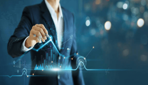 Business life cycle-tycoonstory | tycoonstory media Hand placing wooden blocks in a staircase shape, symbolizing the incremental stages of business growth.