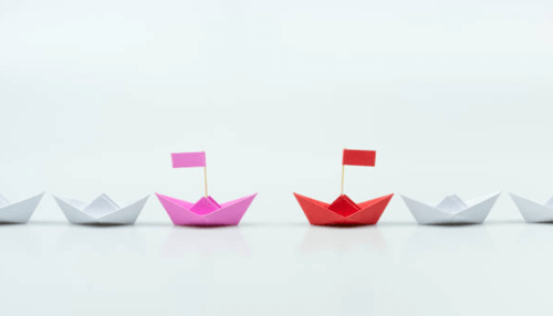 Difference between founding members and cofounders-tycoonstory | tycoonstory media Paper boats symbolizing the roles of founders and co-founders, representing leadership, teamwork, and navigating challenges together in business ventures