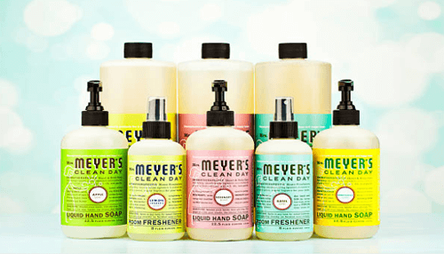 Mrs. Meyer’s eco friendly cleaning products-tycoonstory | tycoonstory media Hotel truly eco-friendly concept displayed with a collection of meyer’s clean day natural hand soaps and room fresheners arranged against a soft background.