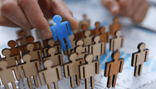 Recognize targeted audience Representing the concept of building a strong social media presence by selecting the right individuals from a group to highlight.