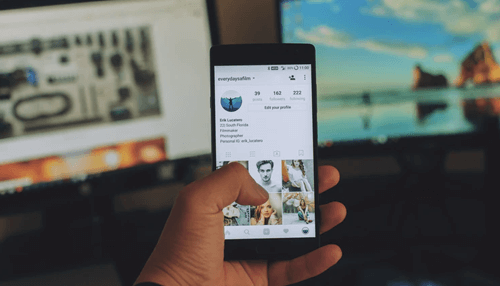 Tech stack User browsing a mobile app interface on a smartphone, highlighting the mobile tech stack experience.