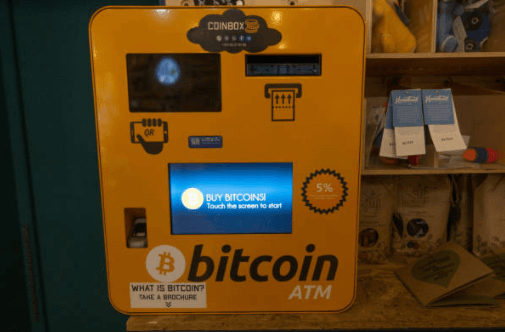 Bitcoin atms-tycoonstory | tycoonstory media Yellow bitcoin atm machine for buying bitcoin digital currency in a store.