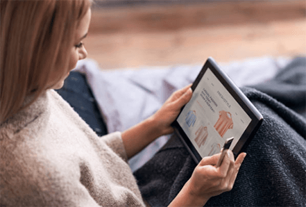 Seo tricks for ecommerce Seo tricks for ecommerce illustrated by a woman shopping online on a tablet while browsing product listings from home