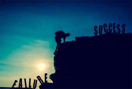 Startup mistakes Startup mistakes visualized by a figure climbing from failure toward success, representing lessons learned and overcoming early business errors.