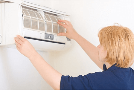 Changing ac filter-tycoonstory | tycoonstory media Homeowner cleaning and maintaining the filter of an air conditioning system for improved cooling efficiency.