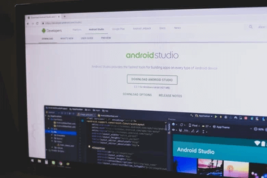 An android emulator online-tycoonstory | tycoonstory media Android studio interface open on a monitor, displaying development tools used for testing apps on an android emulator.