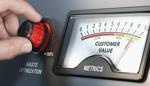 Why your business should adopt lean thinking - tycoonstory | tycoonstory media Hand adjusting optimization dial with a gauge measuring customer value, illustrating lean thinking concepts.