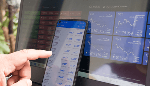 Methods to sell bitcoin for cash - tycoonstory | tycoonstory media A person using a smartphone to monitor cryptocurrency and bitcoin market data, highlighting the real-time trading of digital currencies.