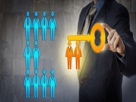 Reasons for hiring temporary staff Businessperson selecting key figures for temporary staffing, symbolizing the importance of choosing the right people for temporary roles within an organization.