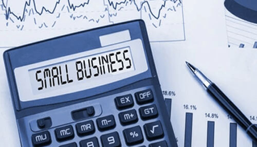 Financing for small businesses Calculator and financial charts representing small business finances, emphasizing the challenges and opportunities for cbd businesses and high-risk merchants.