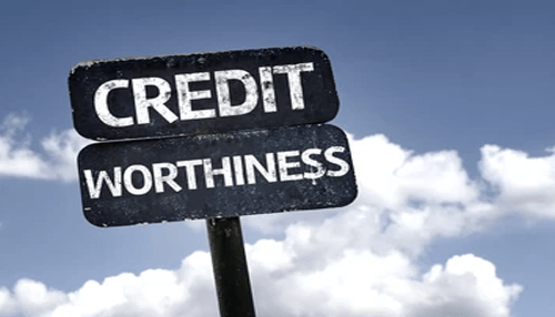 Improves credit worthiness Business loan approval depends on credit worthiness sign against blue sky