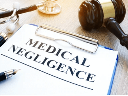 Medical negligence A legal document labeled'Medical Negligence' with a gavel and stethoscope, representing wrongful death cases involving medical malpractice.