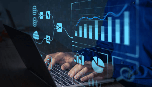 Asset finance Professional using a laptop with digital data analytics showcasing asset finance trends and insights through graphs and financial data.