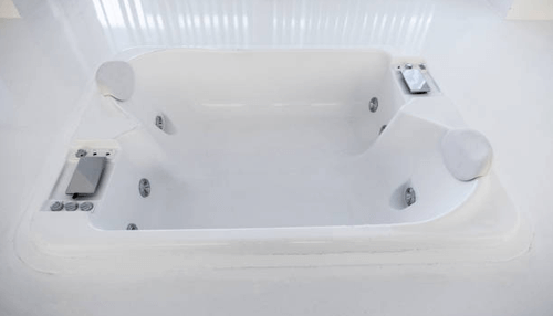 Consider your requirements Modern bathtub equipped with ergonomic tub pillow for enhanced comfort and relaxation.