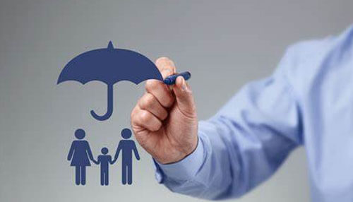 Insurance group - tycoonstory | tycoonstory media A person draws an umbrella symbol protecting a family icon, representing coverage and security provided by atlantic charter insurance groups.