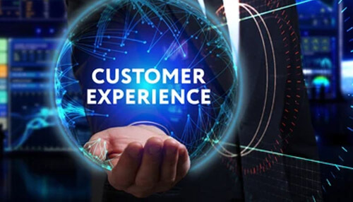 Improving the customer experience End-to-end supply chain and customer experience concept with a businessman holding a glowing sphere and digital elements.