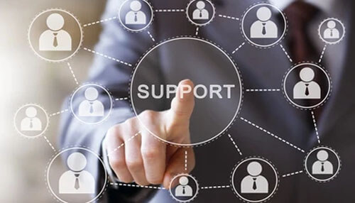 Support network - tycoonstory | tycoonstory media Business professional pointing at a digital network labeled “support,” representing essential support systems for a small startup business.