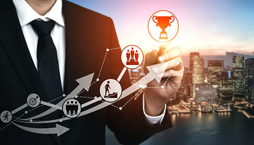 Achievable Digital kpi dashboard in hands highlighting performance metrics used to measure and achieve business goals.