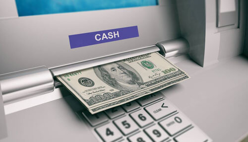 Automatic cash out Image of an atm dispensing a 0 bill, representing the process of cash out through an automated withdrawal.