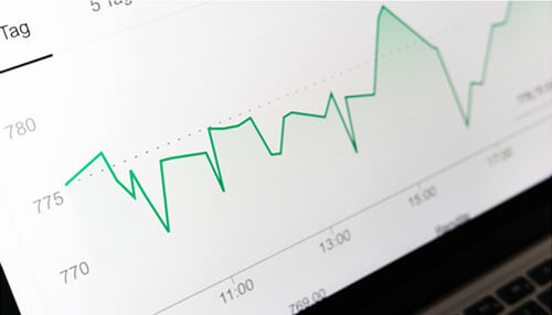 Get the right tools for your growth strategy - tycoonstory | tycoonstory media Close-up of a stock market graph showing an upward trend, symbolizing growth and success in a business venture.