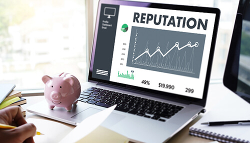 Laptop displaying a reputation graph with financial data, illustrating the strong reputation of ambetter contracting in the insurance industry. Ambetter contracting