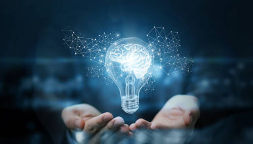 Glowing lightbulb symbolizing creative idea generation and innovation in the product development life cycle Product development life cycle