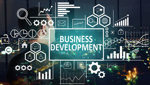 Plan your business’s development Business professional surrounded by digital icons, symbolizing data analysis and business development in the real estate industry