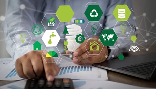 Environmental consultant - tycoonstory | tycoonstory media A person using calculator with eco friendly and sustainable icons, energy efficiency concepts and green business practice.